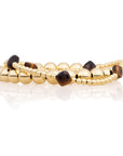 Tiger Eye Cushion Cut Saturn Armbanden Stack | Goudkleurig